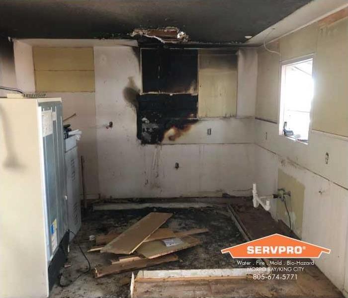 a picture of a kitchen after a fire